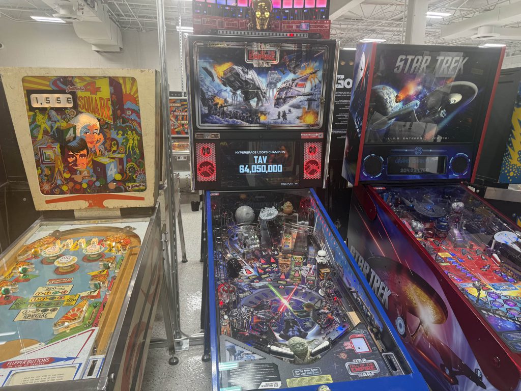A lineup of three pinball games including 4 Squre, Star Wars Fall of the Empire and Star Trek